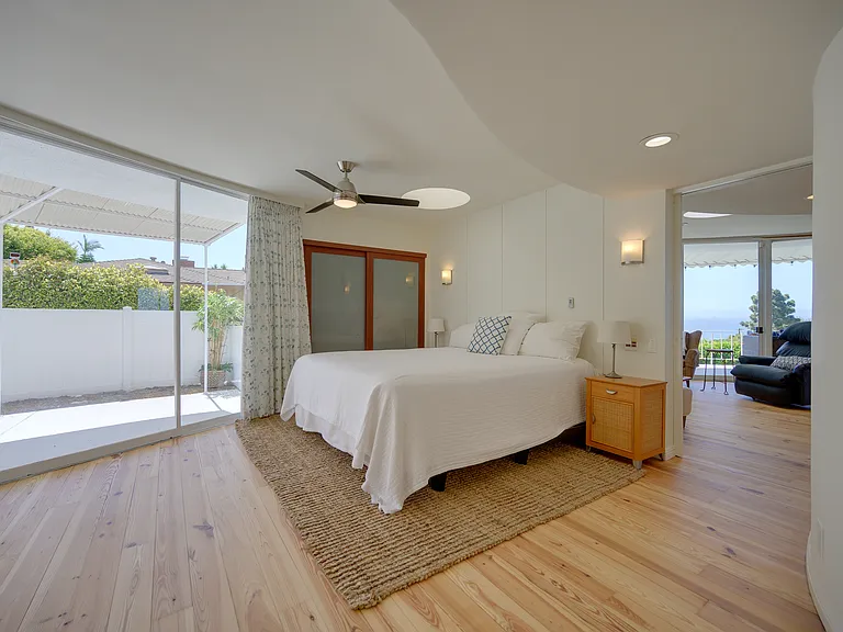 Primary bedroom with plenty of built in closet space