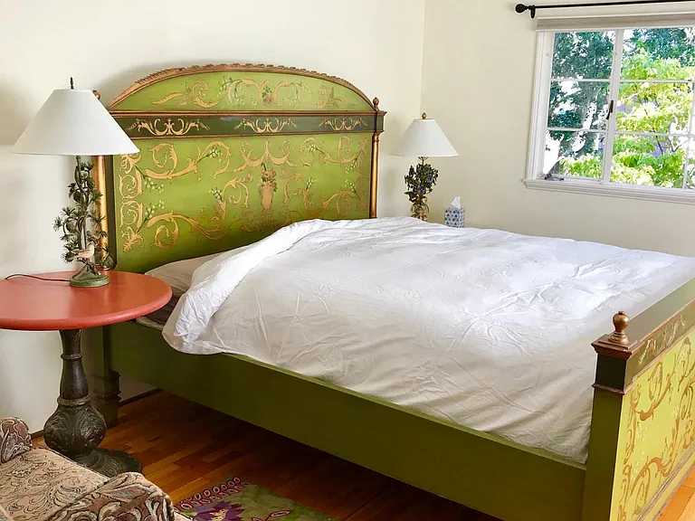 Master bedroom with hand painted, king size bed