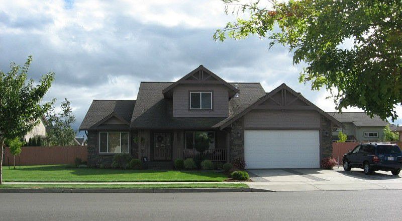 Beautifully landscaped home within walking distance to schools! Attached 2 car garage with additiona