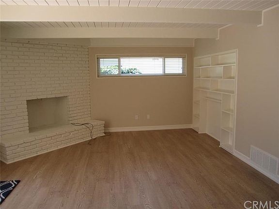 BUILT IN BOOK CASE IN FAMILY ROOM