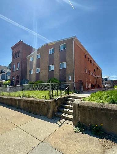 For Rent: Historic Charm at 2300 Eutaw Place Your Urban Retreat Awaits! Photo 1