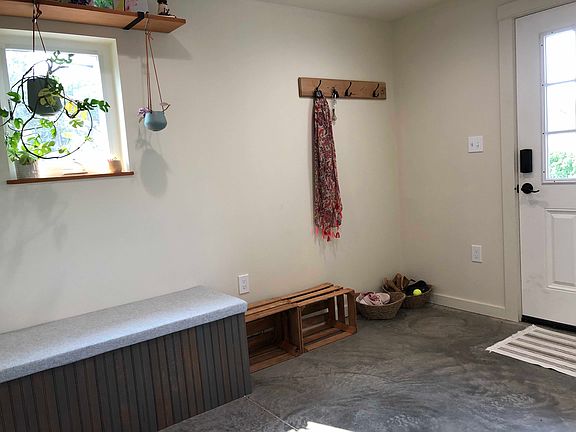 A separate entry area provides an area to take off gear and store a few bicycles etc.