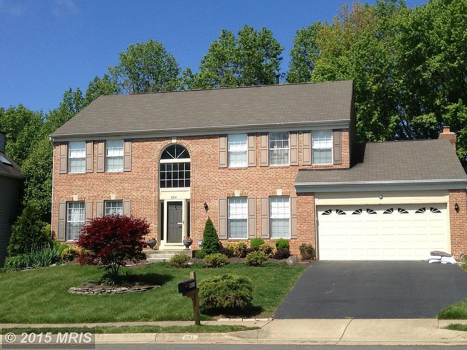 Beautiful brick front colonial backs to trees