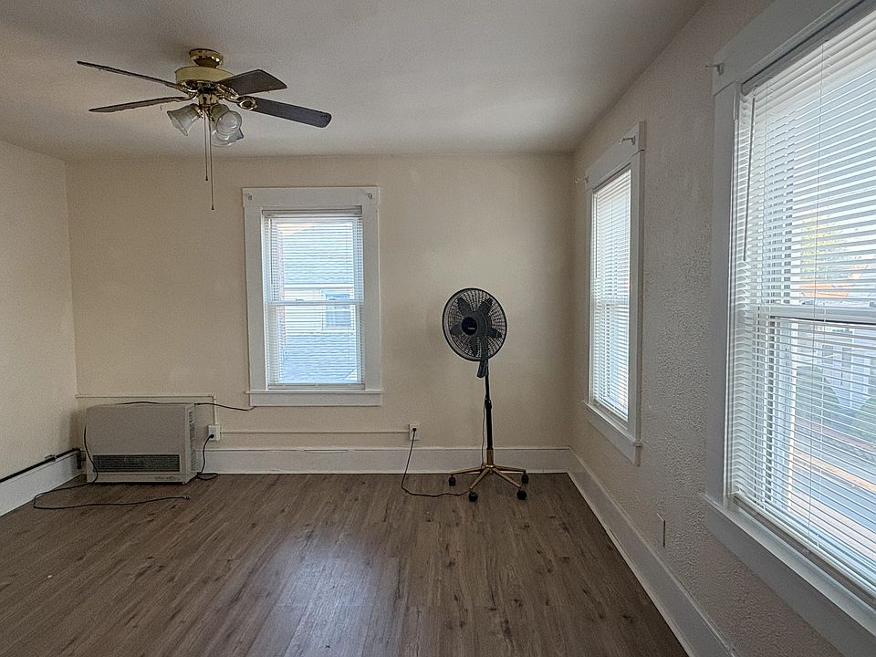 living room with three windows
