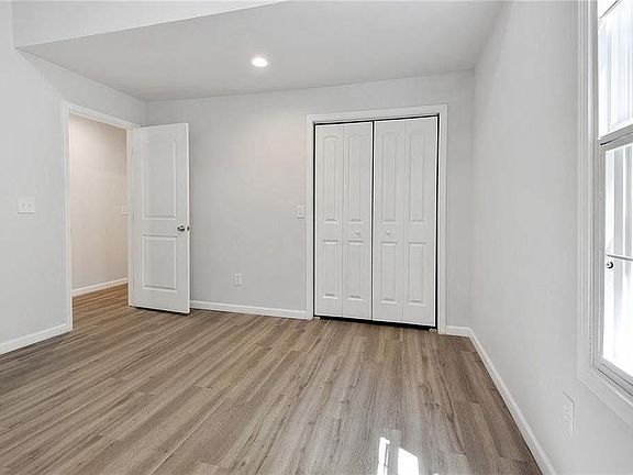 Master bedroom with walk-in closet