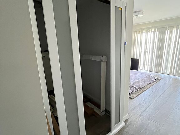 Master Huge walk in closet with dresser inside. Closet doors have not been finished in this photo.