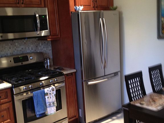 Renovated kitchen with stainless steel appliances