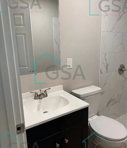 694 Saxon Ave — Photo 16
