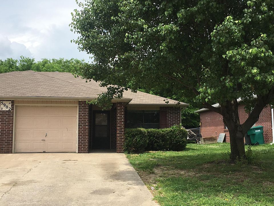 Tree shaded lot.