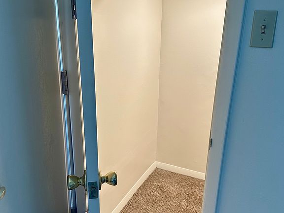 Coat closet behind front door.