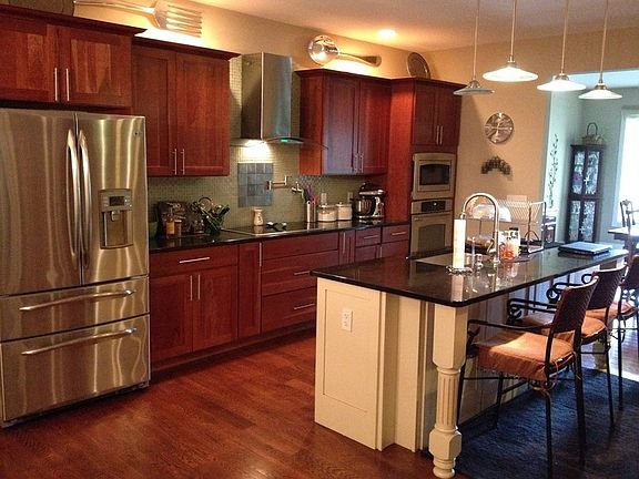 Gourmet Kitchen - Granite - Cherry Cabinets - Stainless Appliances
