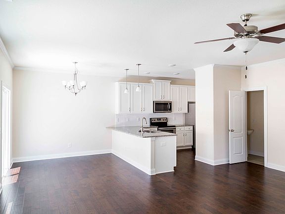 Gorgeous upgraded light fixtures and hard wood floors come included with this home!