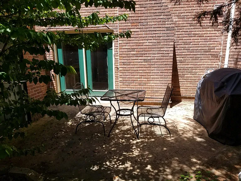 Lovely, private patio with outdoor storage