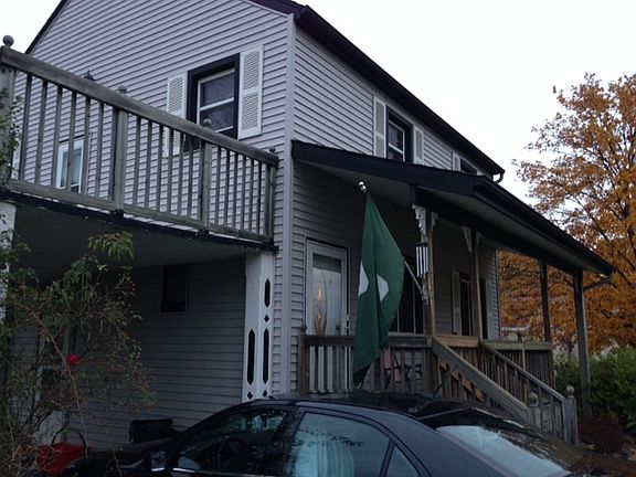Carport/upstairs deck