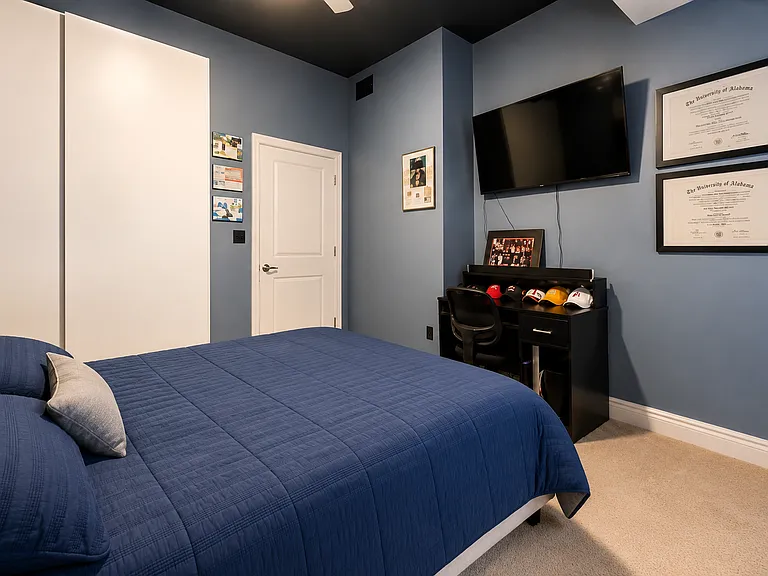 Spacious bedroom fits a king bed