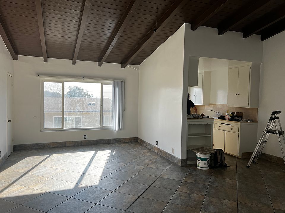 Living room with eating area and kitchen on the right