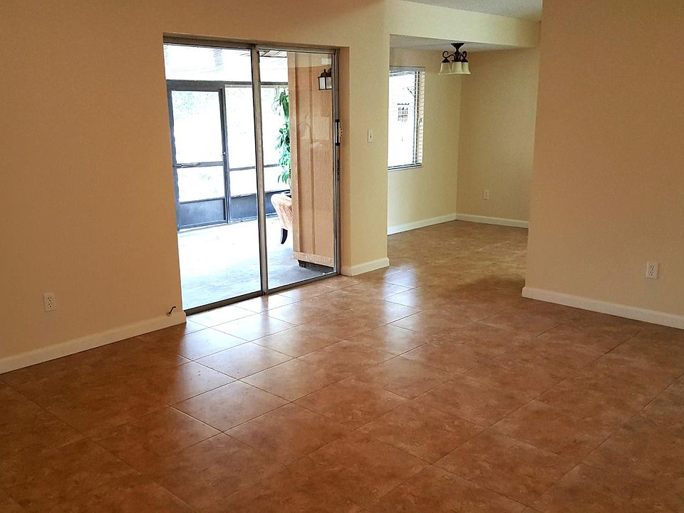 Eat in kitchen and family room lookout onto screened patio and wood deck.