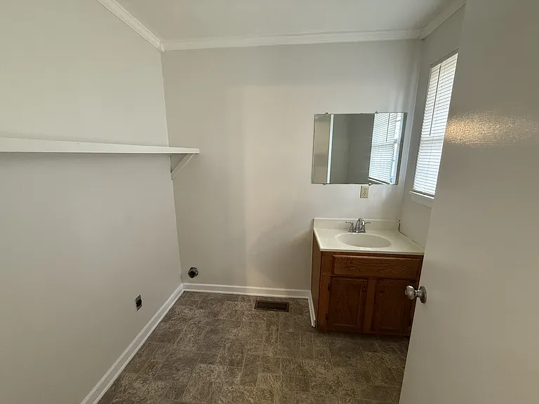 Downstairs Half Bath / Utility Room