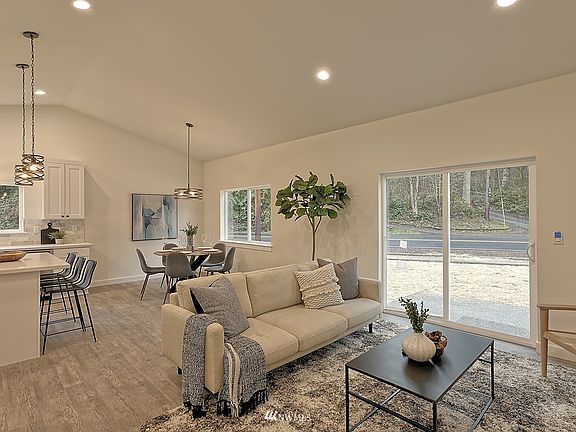 Eating Space off Kitchen to Great Room. Photos of similar home in subdivision for reference only.>