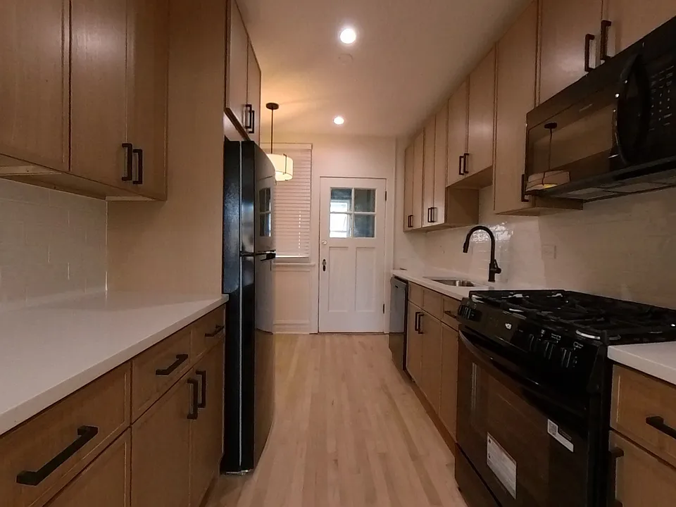 3054-58 N Kolmar Ave/4539-53 W. Barry