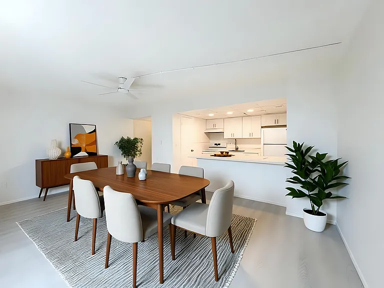 Two-bedroom open-kitchen and dining room area.