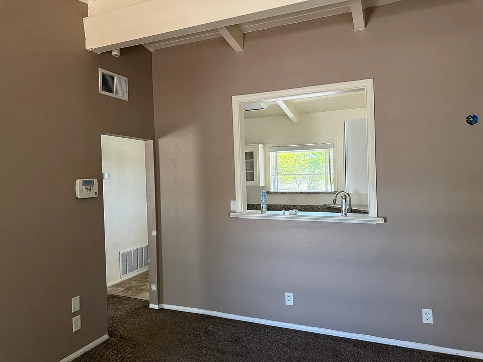 living room looking into kitchen
