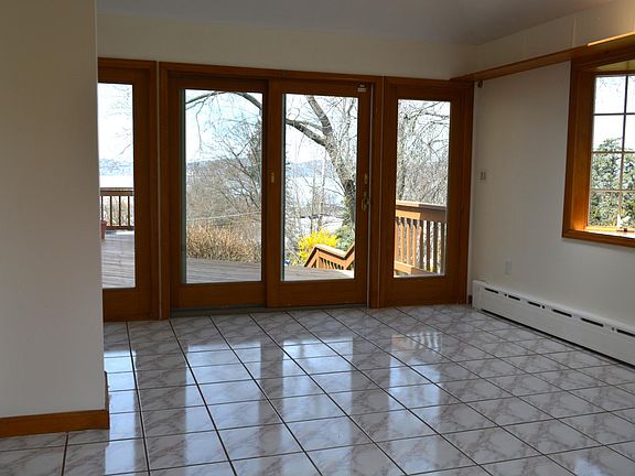 Family room with views and sliding doors to large deck.