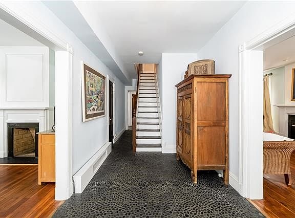 Welcoming entry foyer with river stone flooring