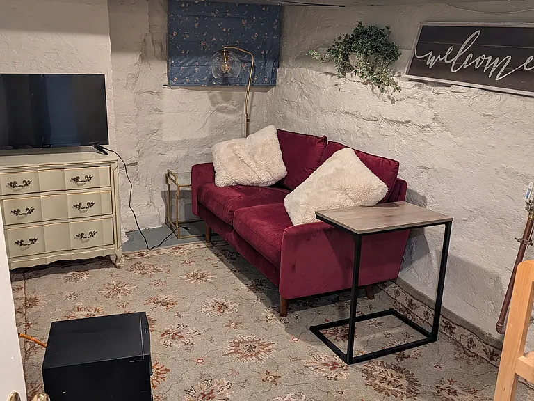LIVING ROOM WITH TV AND STORAGE, LOCATED CLOSE TO KITCHEN
