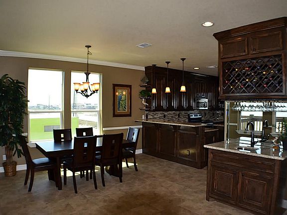 Wet bar separates the living and dining area.