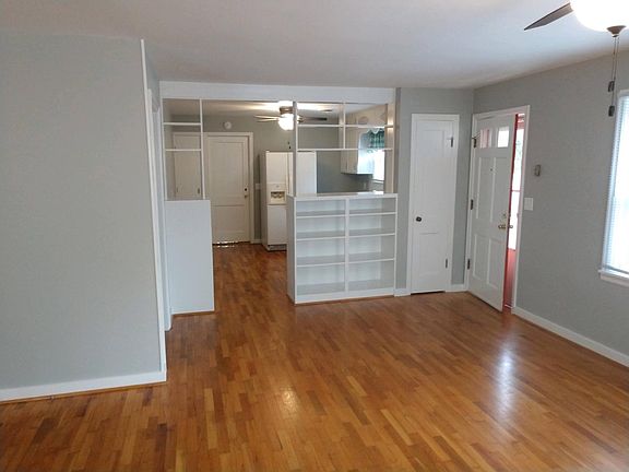 Living room looking into the kitchen - built ins