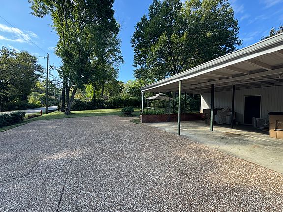 Carport + guest parking.