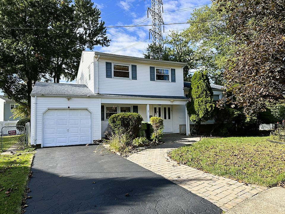 Front View of House. Garage w. Private Driveway