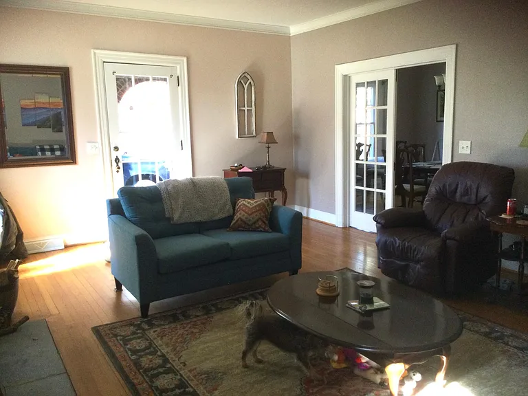 Living room looking towards side porch entry.