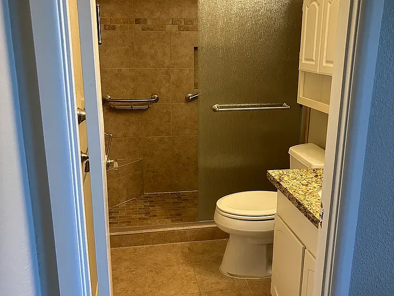 Two bathrooms with walk-in showers.