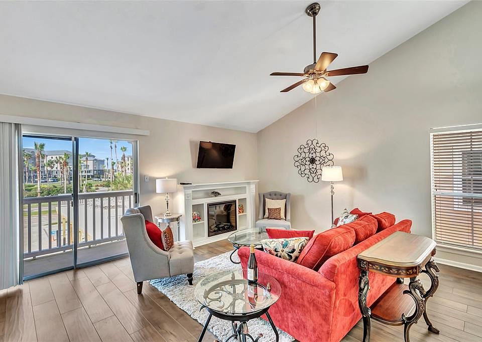 Open Spacious Floor plan! Comfy cozy living area with vaulted ceiling and remote controlled electric fireplace.