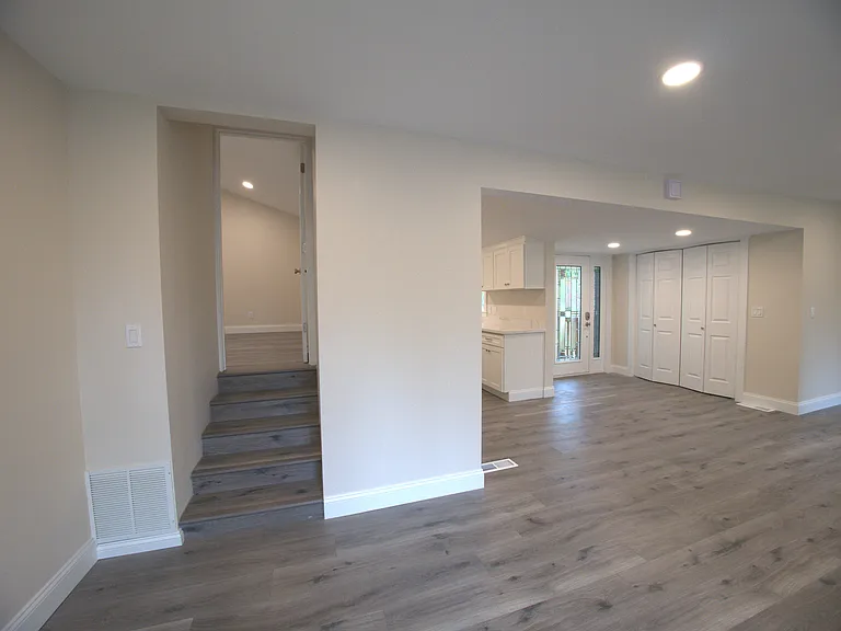 Stairs to main bedroom and bathroom.