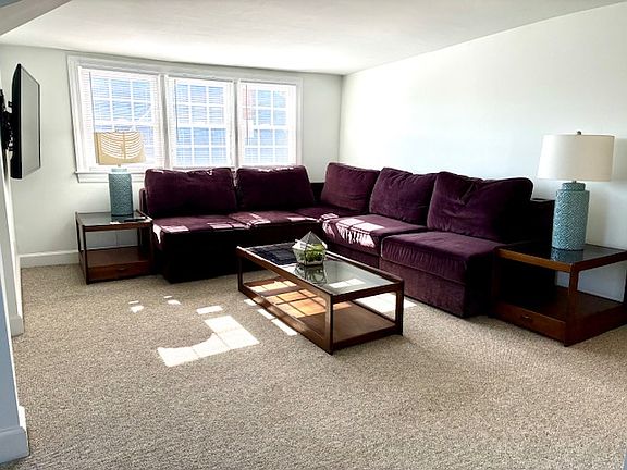 Living room with large mounted smart TV