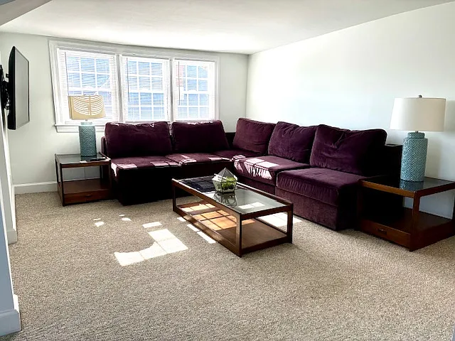 Living room with large mounted smart TV