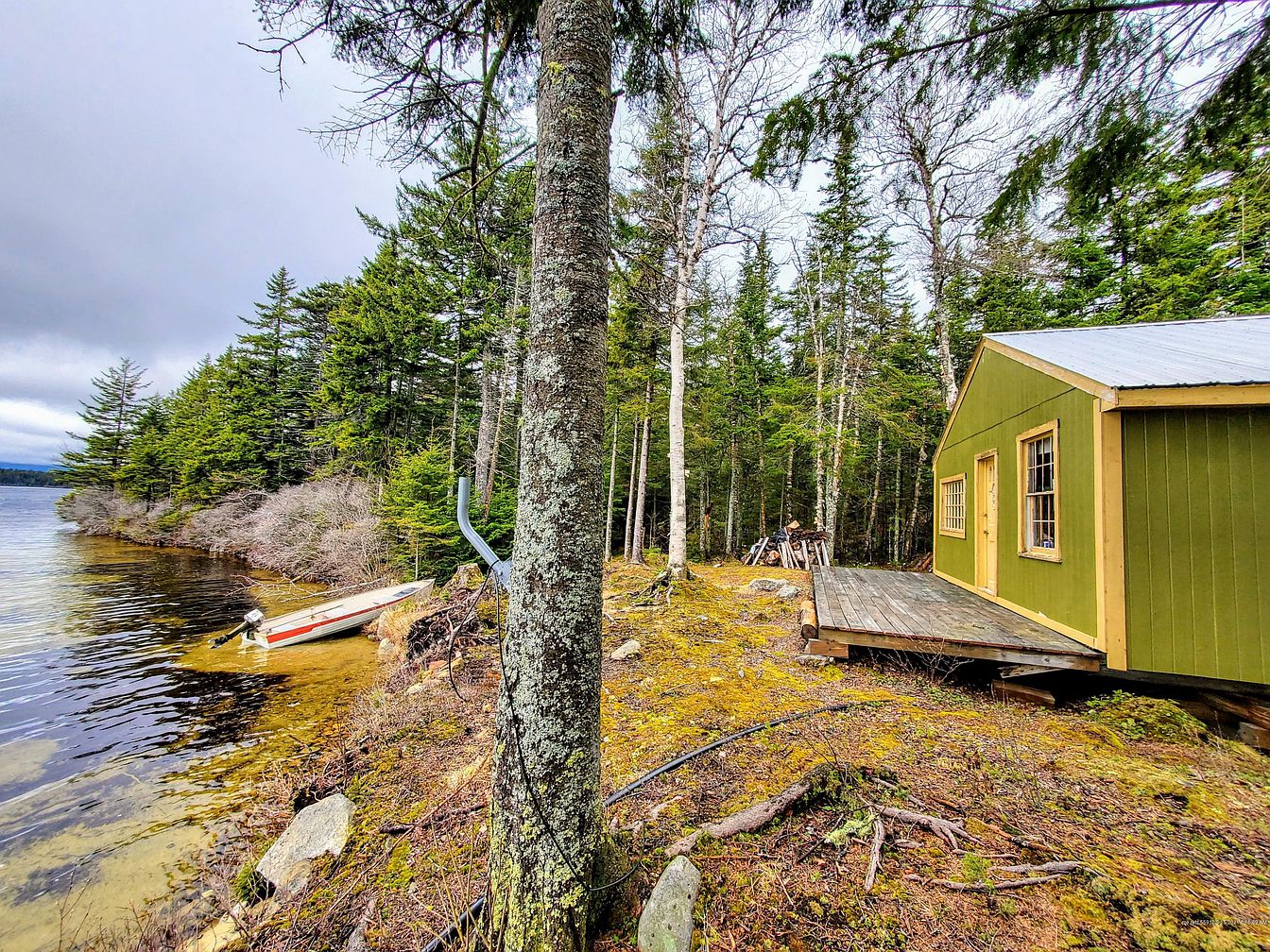 c. 1970 OffGrid Lakefront Cabin For Sale in Rangeley, ME 04970. 84K