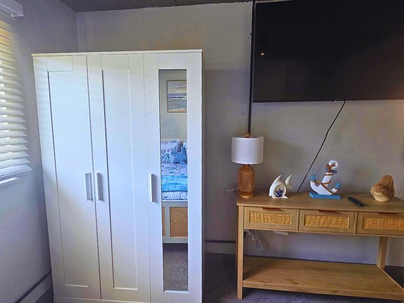 Smart TV with Netflix included and a spacious closet for added comfort.