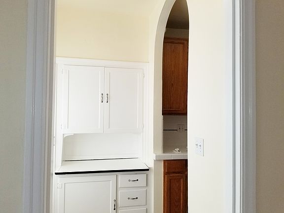 Dining nook leading to kitchen