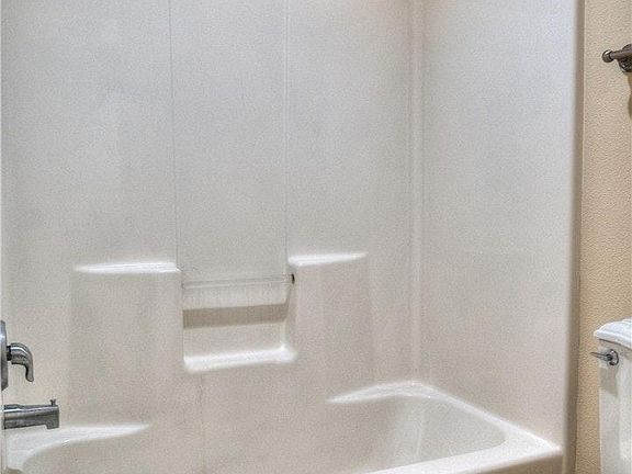Pictures are of a Similar Home. Carpet, Wall Color and Finis