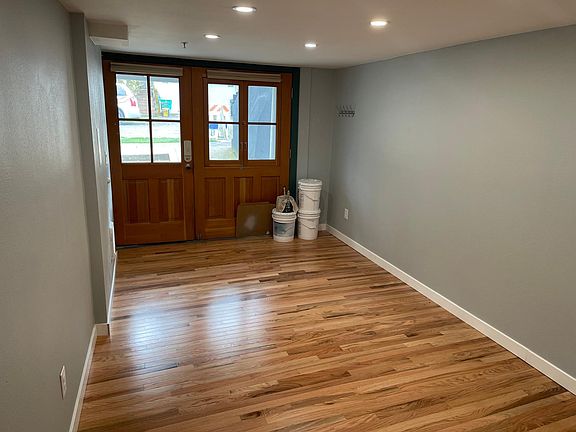 The carriage doors allow a ton of natural light in the living room.