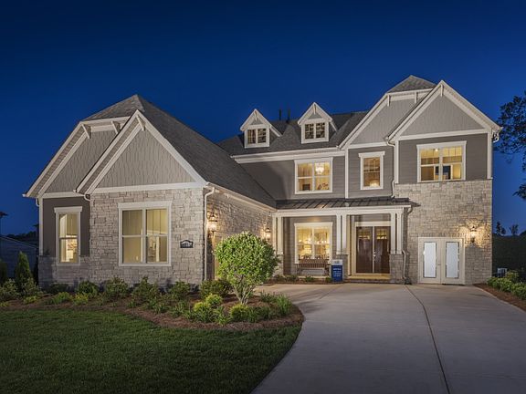 Gatefield Exterior 3 features Stone, Shakes, Siding and Covered Front Porch