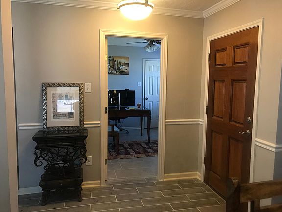 Entrance. 4th bedroom being used as a study. Note the tiled floor throughout the house