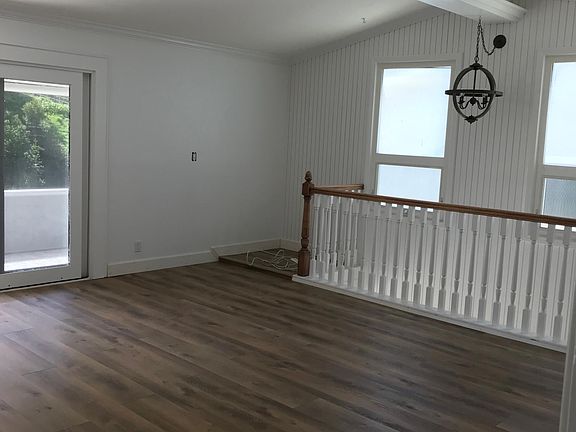 Living room. All new floors and light fixtures.