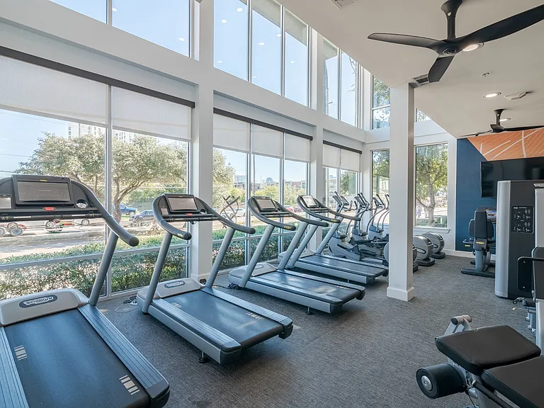 Cardio Equipment in the Fitness Center at Abstract at Design District in Dallas TX, 75207