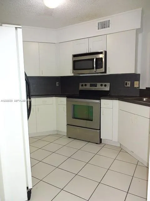Vista Al Lago Condo — Photo 4