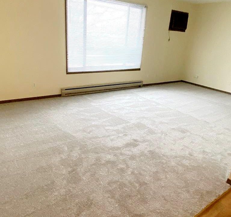 Fresh new living room carpet & fresh paint!